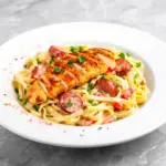 creamy cajun chicken and sausage pasta - featured image