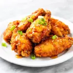 crispy honey garlic chicken wings - featured image