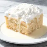 tres leches cake with whipped cream - featured image