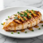 air fryer chicken breast with honey garlic butter glaze - featured image