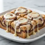 gooey cinnamon roll cookie bars - featured image