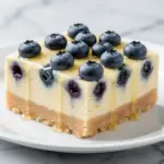 silky lemon blueberry cheesecake bars - featured image